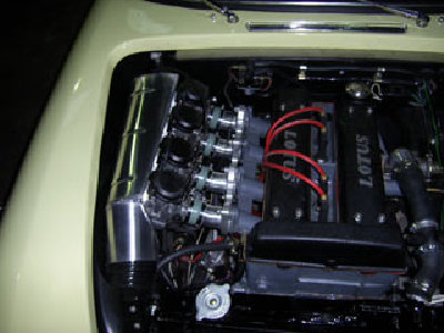 Lotus_elan_with Bike Carbs.jpg and 